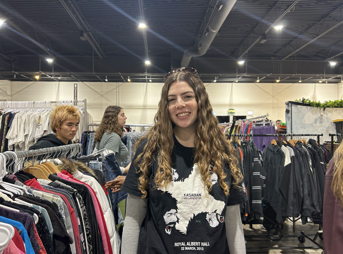 Katie shopping in different booths at the Thrift Fest.